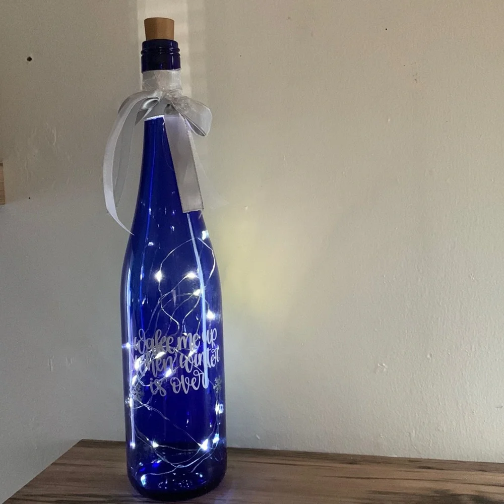 ‘Wake Me When Winter Is Over’ blue wine bottle lantern